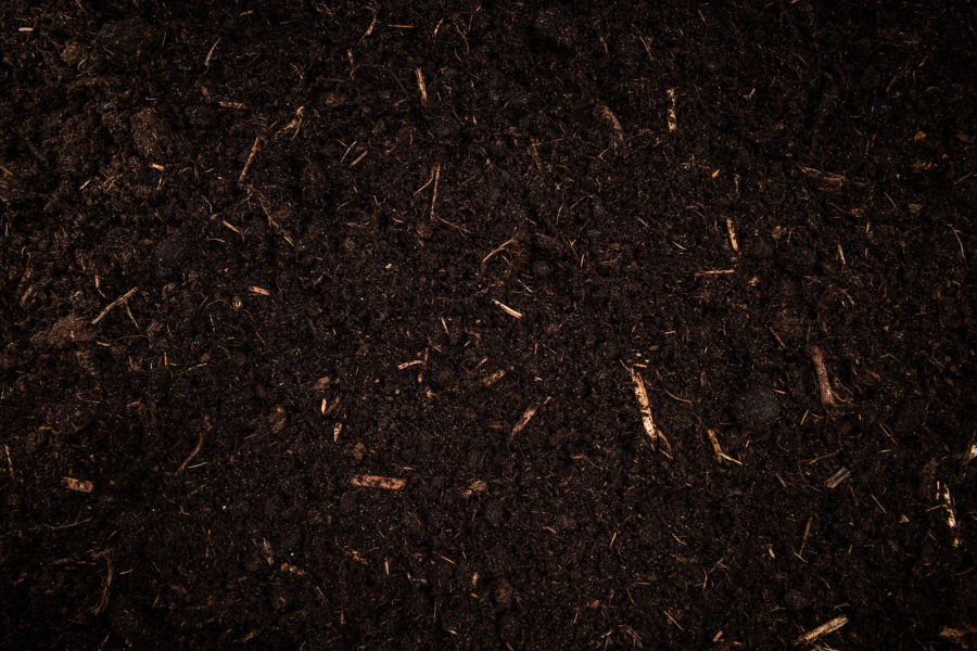 Garden Soil , Dark Cultivated Turf Soil , Gardening and Farming Concept, Background.